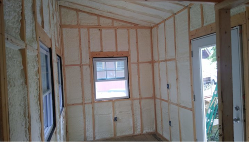 Closed cell spray foam after installation, showing the completed insulation.