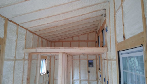 Completed closed-cell spray foam, showcasing the final result of the insulation project.